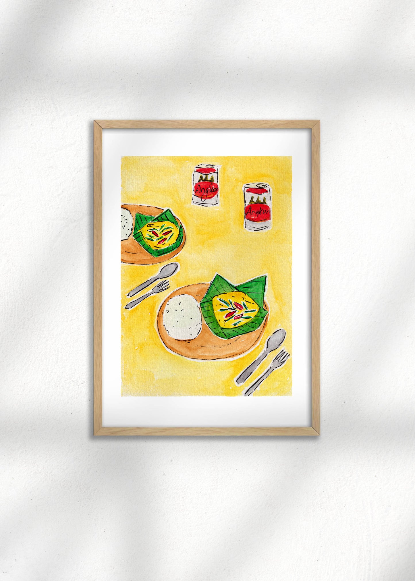 A framed Art Print of a Cambodian Fish Amok and Angkor beers on a yellow background, perfect as kitchen decor