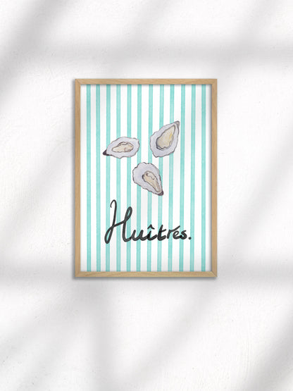Framed artwork with oyster illustrations and the word 'Huitres' on a striped background.
