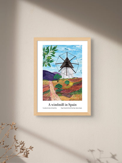 An art poster of a windmill in Spain on a wall.