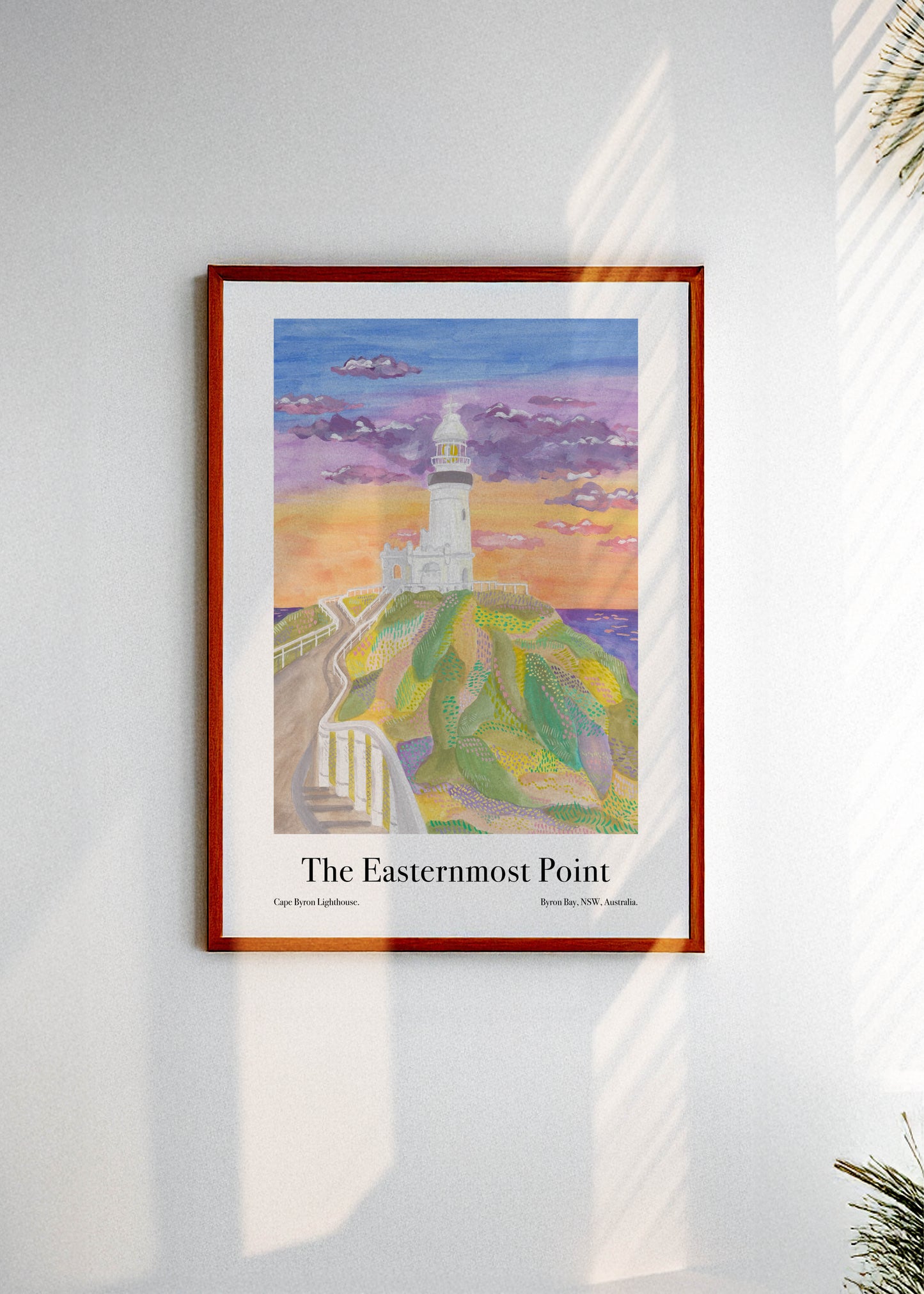 A framed art poster with the Byron Bay Australia lighthouse and the text: "The Easternmost Point"