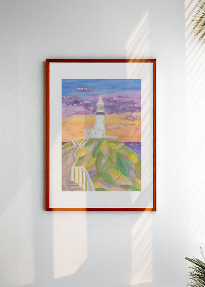 Framed artwork of the Byron Bay lighthouse in Australia on a white wall